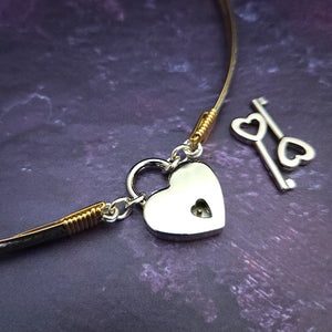 Our ‘WILD FLOWER’ collection speaks of rambling cottage gardens. Sensual and romantic. This artisan BDSM submissive jewelry is handcrafted in a floral pattern of sterling silver. The FLEXIBLE Wild Flower Locking BDSM Submissive Collar is made in two pieces, allowing it to be flexible instead of rigid. This romantic piece is Sterling Silver accented with 14k Gold Filled accents. 