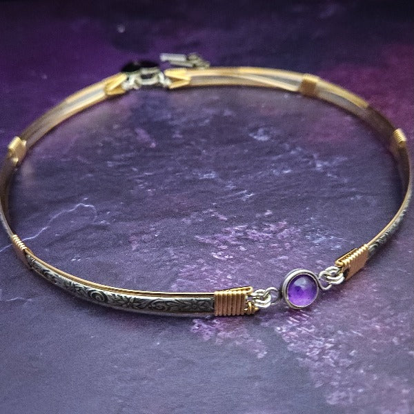 Our ‘WILD FLOWER’ collection speaks of rambling cottage gardens. Sensual and romantic. This artisan BDSM submissive jewelry is handcrafted in a floral pattern of sterling silver. The FLEXIBLE Wild Flower Locking BDSM Submissive Collar is made in two pieces, allowing it to be flexible instead of rigid. This romantic piece is Sterling Silver accented with 14k Gold Filled accents. 