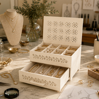 Jewelry box with jewelry on a table in a workshop setting