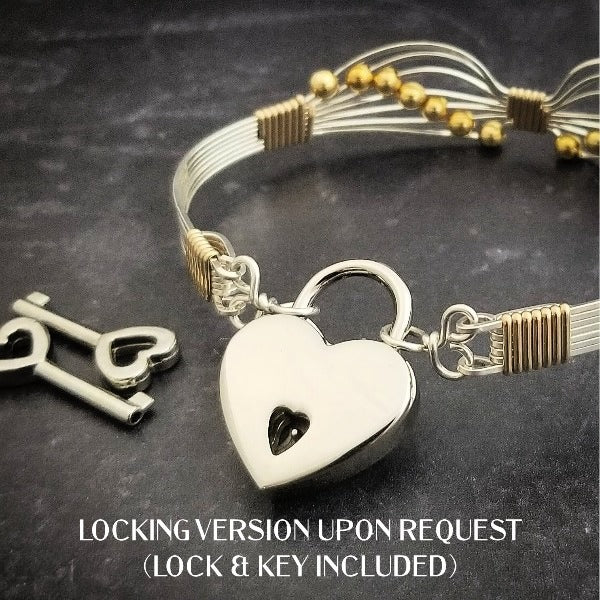 Artisan wire wrapped bracelet is created with precious metals. Hand sculpted into soft wings and embellished with strategically placed beads to form a fluttering butterfly. By My Secret Heart Studios