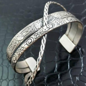Bold. Dramatic. Original. Our CROSSOVER CUFFS have three patterns of sterling silver, each gently crossing over and through the others to form a unique cuff bracelet. This is the perfect companion for almost all of our collections.
