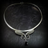 For Your Angel. (Even brats look like the sweet little angels in this collar, lol.) Sterling silver with a faceted briolette drop in Black Onyx crystal. Traditional hook and eye clasp.