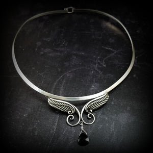 For Your Angel. (Even brats look like the sweet little angels in this collar, lol.) Sterling silver with a faceted briolette drop in Black Onyx crystal. Traditional hook and eye clasp.