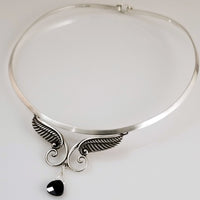 For Your Angel. (Even brats look like the sweet little angels in this collar, lol.) Sterling silver with a faceted briolette drop in Black Onyx crystal. Traditional hook and eye clasp.