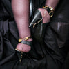 Slip the golden ring around the heel of your stilettoes, and the other ring into the lock of your locking ankle bracelet and voila, you now have on locked heels. Sweet. Simple. Sexy as hell!