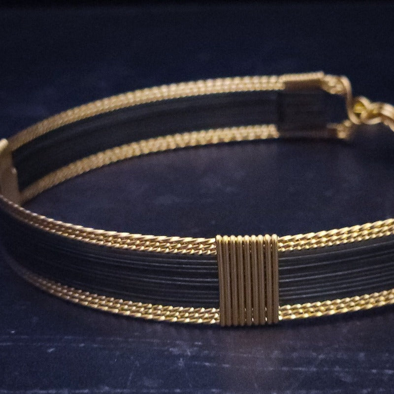 Be daring and adventurous with your style with the AMARI BDSM Submissive Collar. Crafted from a luxurious combination of blackened sterling silver and surrounded by hand twisted accents, this collar will take you from dusk till dawn with an eye-catching elegance that will turn heads wherever you go. Limited Release