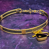 Be daring and adventurous with your style with the AMARI BDSM Submissive Collar. Crafted from a luxurious combination of blackened sterling silver and accented with twisted gold, this collar will take you from dusk till dawn with an eye-catching elegance that will turn heads wherever you go. 