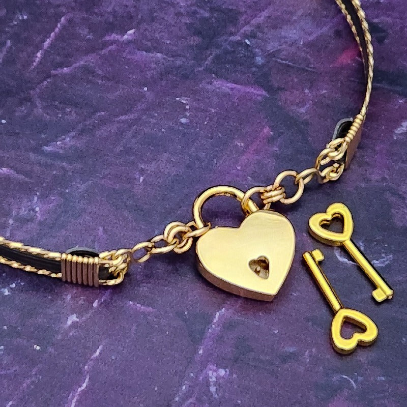 Be daring and adventurous with your style with the AMARI BDSM Submissive Collar. Crafted from a luxurious combination of blackened sterling silver and accented with twisted gold, this collar will take you from dusk till dawn with an eye-catching elegance that will turn heads wherever you go. 