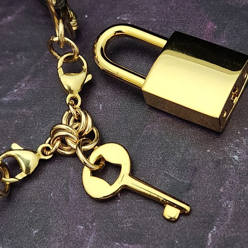 DOMINANT'S KEY KEEPER - AMARI, Black and Gold, BOLD