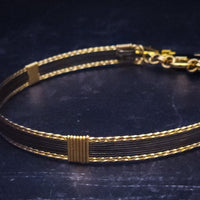 Be daring and adventurous with your style with the AMARI BDSM Submissive Collar. Crafted from a luxurious combination of blackened sterling silver and surrounded by hand twisted accents, this collar will take you from dusk till dawn with an eye-catching elegance that will turn heads wherever you go. Limited Release