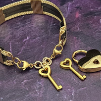 Discover a daring and captivating style with the AMARI V STYLE BDSM Submissive Collar. Crafted from a sumptuous blend of blackened sterling silver and complemented with hand twisted accents, this collar will be a striking statement of elegance from day to night. Experience urban chic with a hint of gothic glamour!