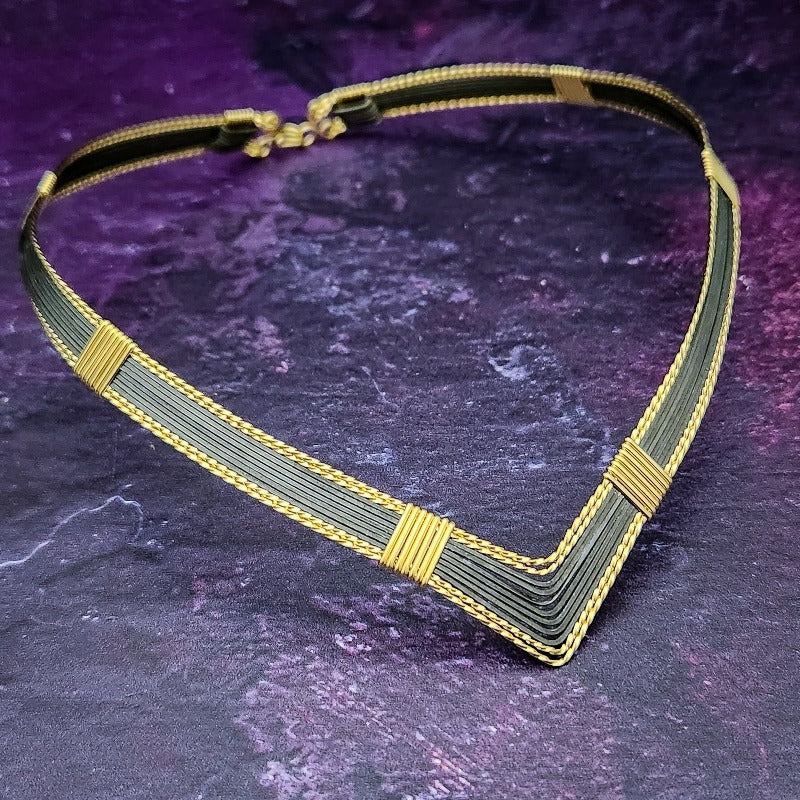 Discover a daring and captivating style with the AMARI V STYLE BDSM Submissive Collar. Crafted from a sumptuous blend of blackened sterling silver and complemented with hand twisted accents, this collar will be a striking statement of elegance from day to night. Experience urban chic with a hint of gothic glamour!