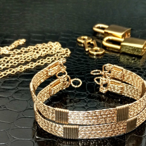 Wire wrapped submissive bracelets that are hand crafted in strands of twisted 14k gold filled and accented with 14k gold filled wraps. 