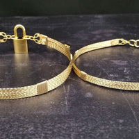 Showcase your power and taste with ASHANTI Slim Collar. This handcrafted collar is artfully crafted with twisted 14K gold filled wire and elevated with gold wraps. A touch of chain in the back ensures a snug fit, so you can move with ease. Wear ASHANTI TWISTED alone or layer it with other chains and pendants--it's the perfect foundation for building endless elegant looks! Plus, the locking collar takes your look up a notch. 