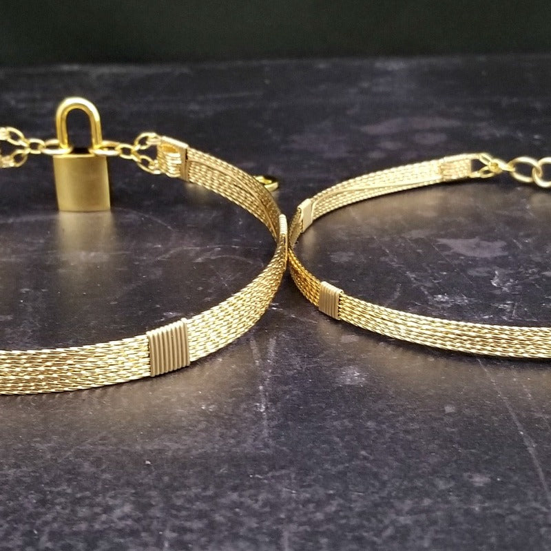 Showcase your power and taste with ASHANTI Slim Collar. This handcrafted collar is artfully crafted with twisted 14K gold filled wire and elevated with gold wraps. A touch of chain in the back ensures a snug fit, so you can move with ease. Wear ASHANTI TWISTED alone or layer it with other chains and pendants--it's the perfect foundation for building endless elegant looks! Plus, the locking collar takes your look up a notch. 