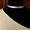 Showcase your power and taste with ASHANTI Slim Collar. This handcrafted collar is artfully crafted with twisted 14K gold filled wire and elevated with gold wraps. A touch of chain in the back ensures a snug fit, so you can move with ease. Wear ASHANTI TWISTED alone or layer it with other chains and pendants--it's the perfect foundation for building endless elegant looks! Plus, the locking collar takes your look up a notch. 