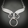 An locking, soft collar for your angel. This angel wing collar pays homage to your BDSM D/s lifestyle and has an O ring attached. Can be worn locked, or with a traditional clasp for discretion. Created with sterling silver chain, suitable for everyone, everyday. Do you think anyone will know what the classic 'Story of O' ring is for??