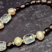 This ONE OF A KIND locking submissive ANGEL WING GEMSTON E COLLAR pays homage to your BDSM D/s lifestyle with beauty and grace. Locks in front. GEMSTONES: Faceted Amethyst Nuggets, Cushion Cut Labradorite , Faceted Tanzanite Rondels & Faceted Grey Moonstone