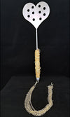 Intended for the serious sadist, it's certainly not for the faint of heart. This paddle should only be used by advanced players. Delivers a blistering sting with one spank. Used with a heavy/hard hand, this paddle will cause bruising and can draw blood. 