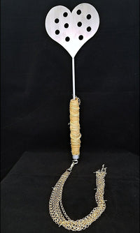 Intended for the serious sadist, it's certainly not for the faint of heart. This paddle should only be used by advanced players. Delivers a blistering sting with one spank. Used with a heavy/hard hand, this paddle will cause bruising and can draw blood. 