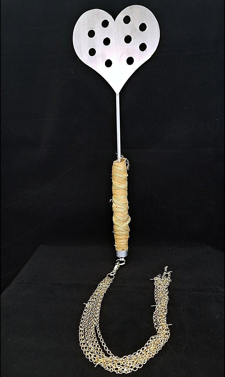 Intended for the serious sadist, it's certainly not for the faint of heart. This paddle should only be used by advanced players. Delivers a blistering sting with one spank. Used with a heavy/hard hand, this paddle will cause bruising and can draw blood. 