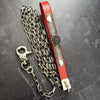 Classic BDSM red and black create a unique One Of A Kind BDSM leash with a bit of drama. The red leather is accented with a plaque of our Soft and Sweet pattern in sterling, and features an unusual black druzy gemstone. 
