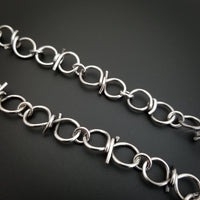 Our version of a Barbed Wire Collar, this beast is from our Brambles Collection, inspired by barbs, thorns and prickly things. This BDSM LOCKING SUBMISSIVE COLLAR is thick, hefty and truly badass. I create the barbs with comfort in mind, they're smooth and aren't long enough to do real damage, but still just a touch dangerous ;D