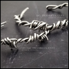 Our version of the a Barbed Wire Cuff, this beast is from our Brambles Collection, inspired by barbs, thorns and prickly things. This cuff is thick, hefty and badass. I create the barbs with comfort in mind, making sure they're smooth and aren't long enough to do real damage, but still just a touch dangerous