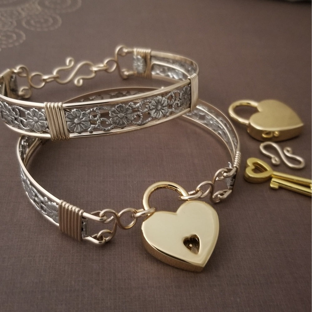 The Bel Fiore is one of our most delicate and feminine designs. Totally discreet. Can be locked for submission or show of Ownership, or worn with the traditional clasp for totally discreet wear.