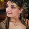 Made a bold statement of your Dominant / submissive lifestyle. The CELTIC PRIESTESS locking submissive collar features chain links inspired by Celtic knots, all created entirely by hand using only a few hand tools. The links are then tumbled with steel shot, creating strength and durability, as well as a silky smoothness. 