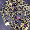 THE CELTIC PRIESTESS LOCKING BELT features chain links inspired by Celtic knots, all created entirely by hand using only a few hand tools. The links are then tumbled with steel shot, creating strength and durability, as well as a silky smoothness. Amethyst and Gold Filled. By My Secret Heart Studios
