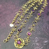 THE CELTIC PRIESTESS LOCKING BELT features chain links inspired by Celtic knots, all created entirely by hand using only a few hand tools. The links are then tumbled with steel shot, creating strength and durability, as well as a silky smoothness. Amethyst and Gold Filled. By My Secret Heart Studios