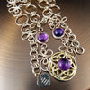THE CELTIC PRIESTESS LOCKING BELT features chain links inspired by Celtic knots, all created entirely by hand using only a few hand tools. The links are then tumbled with steel shot, creating strength and durability, as well as a silky smoothness. Amethyst and Gold Filled. By My Secret Heart Studios