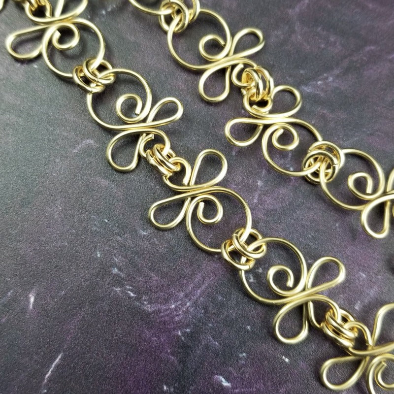 Our CELTIC PRIESTESS COLLECTION of artisan chains pay homage to your BDSM lifestyle with a dramatic Celtic flair. Each piece can be worn independently, or connected, and can be worn LOCKED or with traditional clasps. Features chain links inspired by Celtic knots, all created entirely by hand.  IMAGINE YOUR SUBMISSIVE ... BOUND AND LOCKED IN THESE LUXURIOUS CHAINS. My Secret Heart Studios