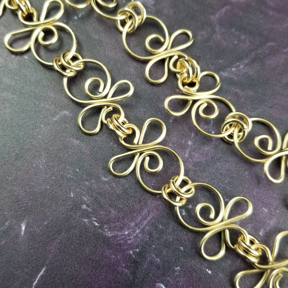 Our CELTIC PRIESTESS COLLECTION of artisan chains pay homage to your BDSM lifestyle with a dramatic Celtic flair. Each piece can be worn independently, or connected, and can be worn LOCKED or with traditional clasps. Features chain links inspired by Celtic knots, all created entirely by hand.  IMAGINE YOUR SUBMISSIVE ... BOUND AND LOCKED IN THESE LUXURIOUS CHAINS. My Secret Heart Studios