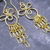The CELTIC PRIESTESS earrings feature chain links inspired by Celtic knots, all created entirely by hand using only a few hand tools. 