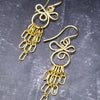 The CELTIC PRIESTESS earrings feature chain links inspired by Celtic knots, all created entirely by hand using only a few hand tools. 