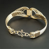 Wire wrapped 14k Gold Filled bracelet inspired by the Egyptian Queen Cleopatra. This locking submissive bracelet is bold and contemporary, and totally discreet for day wear. ORDER A PAIR for stunning handcuffs bracelets or one for sub and one for Dominant. {maybe even chained together!}