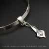 Nature Inspired. Graceful and timeless. This locking submissive BDSM soft collar is the epitome of discretion. The Calla Lily hangs from a sterling chain, but can be removed and slipped onto several of our MSHS submissive collars. Or the 'slide' can also be worn on chains, leather, ribbon, etc. Three versions available: Traditional, Permanently Locking or Lock and Key.