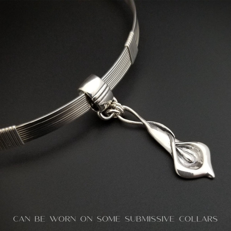 Nature Inspired. Graceful and timeless. This locking submissive BDSM soft collar is the epitome of discretion. The Calla Lily hangs from a sterling chain, but can be removed and slipped onto several of our MSHS submissive collars. Or the 'slide' can also be worn on chains, leather, ribbon, etc. Three versions available: Traditional, Permanently Locking or Lock and Key.