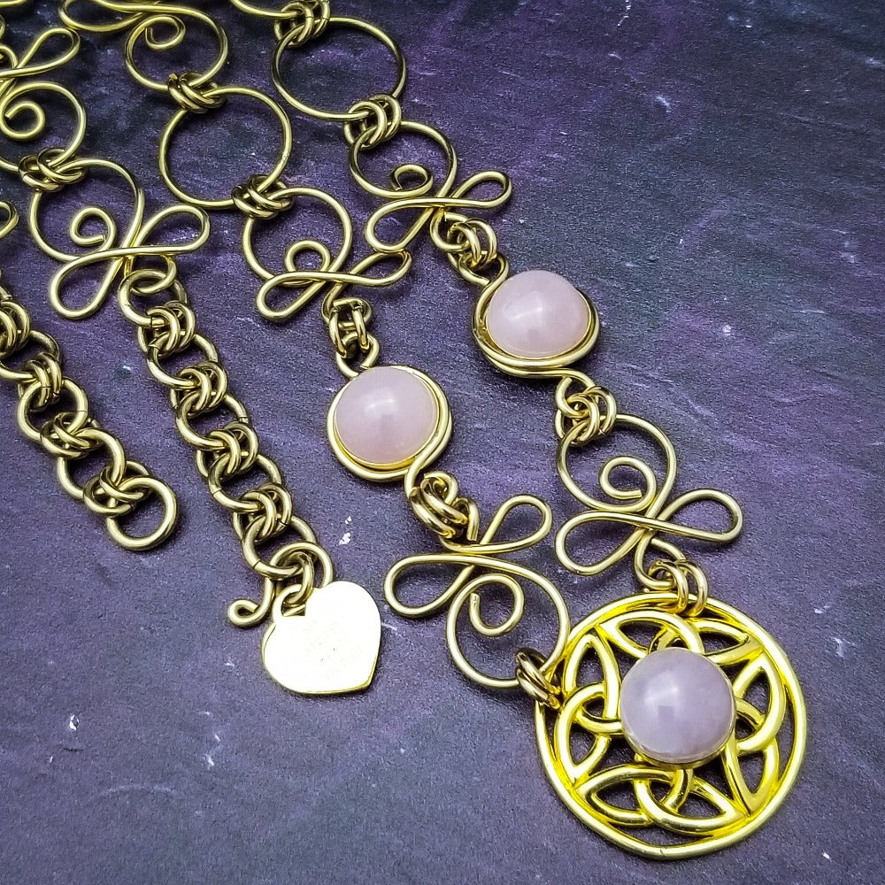 THE CELTIC PRIESTESS MEDALLION BELT features chain links inspired by Celtic knots, all created entirely by hand using luxurious 14K Gold Filled wire and hand selected gemstone cabochons.