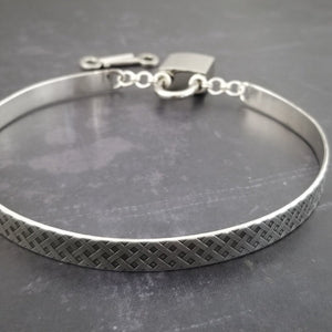 Our Darkenwald design is reminiscent of old castle walls, knights on galloping horses and laughter and ale in the great hall by firelight.  Substantial sterling silver collar accommodates a traditional clasp for discretion, but can also be worn with a padlock and key for a big statement of Ownership.