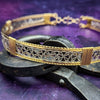 Crafted with a luxurious combination of Art Deco inspired sterling silver and accents of 14k Gold Filled, the DEKKA BDSM Submissive Collar exhibits a unique and feminine style. My Secret Heart Studios