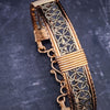 Dekka's BDSM Submissive Handcuff Bracelets or Anklets feature sterling silver lattice work with delicate precious metal accents for a luxurious, daring look. With its intricate design, these bracelets or anklets communicate Ownership in a stylish, understated way.