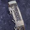 Crafted with a luxurious combination of Art Deco inspired sterling silver and accents of 14k Gold Filled, the DEKKA BDSM Submissive Collar exhibits a unique and feminine style. My Secret Heart Studios