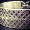 Boldly state your BDSM lifestyle with the Darkenwald cuffs / anklets. Our Darkenwald design is reminiscent of old castle walls, knights on galloping horses and laughter and ale in the great hall by firelight.  Substantial sterling silver cuffs accommodate a traditional clasp for discretion, but can also be worn with a padlock and key for a big statement of Ownership. Nice hefty bracelets for a lifetime of play and pleasure.