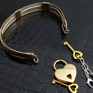 This sterling silver Key Cuff is created with a detachable chain that holds the key to Your slave or sub's locked collars or cuffs. Jewelry clasps clip into rings that attach to the cuff, which makes removing the chain simple. 