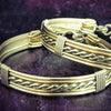 Our Entwined Collection is themed around ropes, paying homage to the ancient art of shibari. These locking BDSM submissive bracelets are so beautifully discreet.  Created in sterling with slim bands of 14k gold filled accents. Can be worn as wrist or ankle restraints.  
