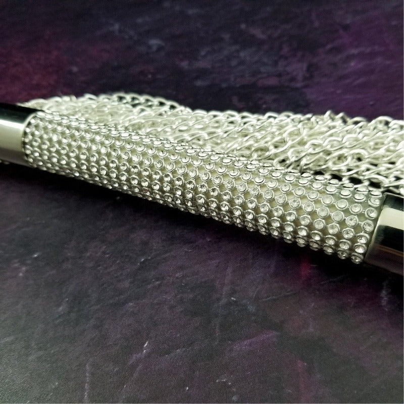 Decisions ... Decisions .... Should you tease, or punish? Imagine Your sub's delight {or trepidation, lol} when they see gorgeous chain flogger! The crystal encrusted silver handle is so pretty, but damn those chains bite! 