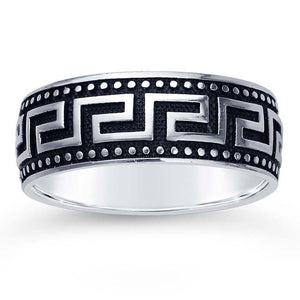 Greek Key Ring from our Meandros Collections, this sterling silver ring is domed with a raised Greek key pattern around the entire circumference. Edged with decorative beading.  The raised pattern is bright-finished and the background is textured and oxidized black adds depth and dimension. The interior is smooth and flat.